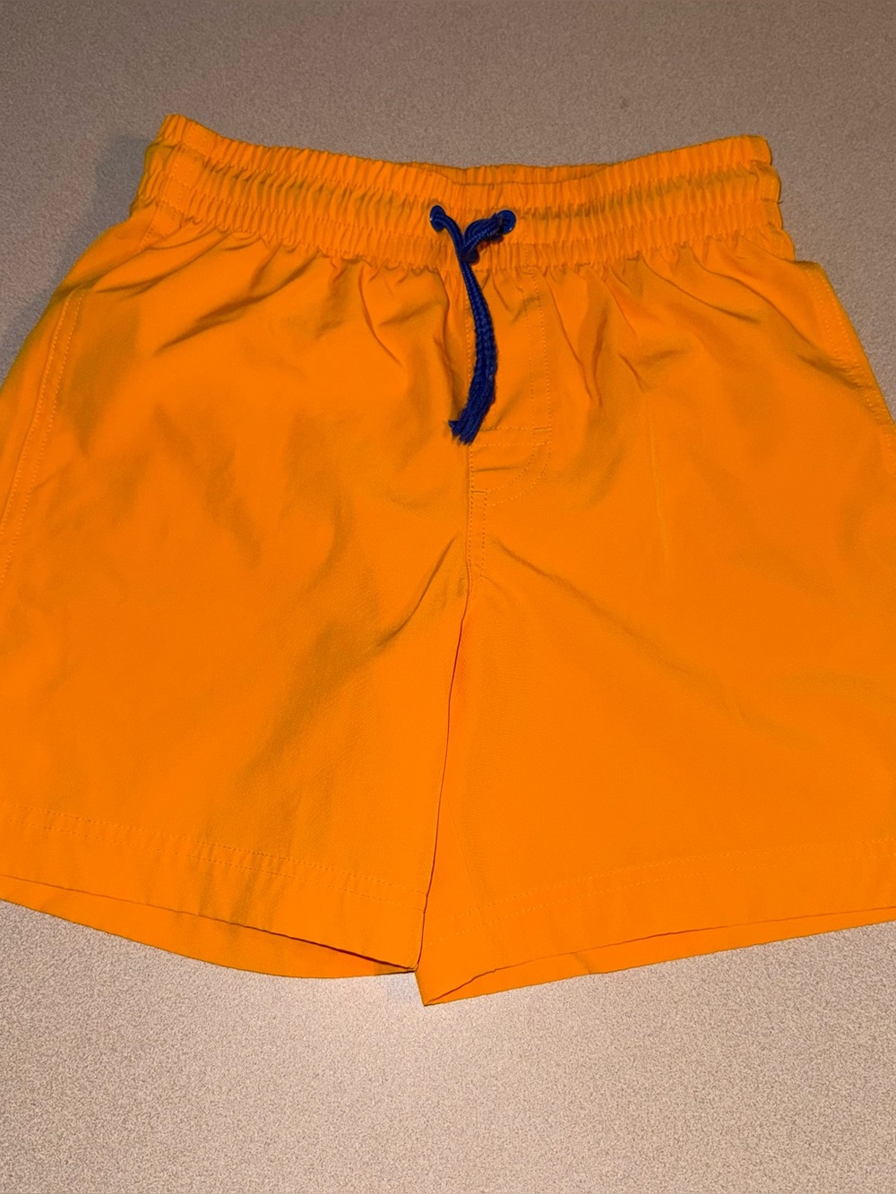 Old Navy boys size L 10-12 swim trunks yellowish orange with blue drawstring